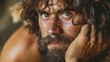 closeup portrait of prehistoric bearded caveman