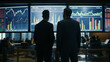 © Ali - businessmen looking at stock analysis graph, business people viewing the stock market analytics, business activity at stock market