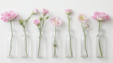 Elegance in Simplicity - Pink Eustomas in Glass Bottles