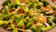 Healthy fresh salad with vegetables, chicken background, pattern. Homemade delicious lunch with chicken, bell pepper, arugula for restaurant, menu, advert or package, close up selective focus