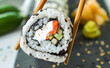 Sushi Roll Platter on dark plate. Salmon sushi set, serving food for restaurant, menu, advert or package, close up, selective focus