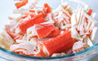 Snow crab, surimi sticks pieces in bowl