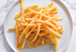 French Fries Crinkle Cut, cutout minimal isolated on plate, white background. Homemade french fries for sale, package, advert, close up, selective focus