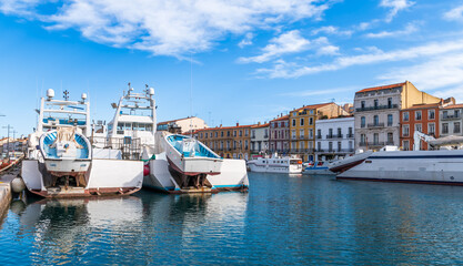 Wall Mural - Quays of the city of Sete with its trawlers, in Herault in Occitanie, France