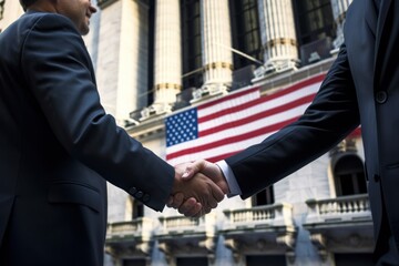 Close-up view of handshaking between two business man with city background.