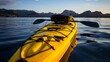 a yellow kayak on the water