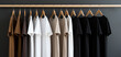 © Darcraft - Men's t-shirts on hangers in a wardrobe.