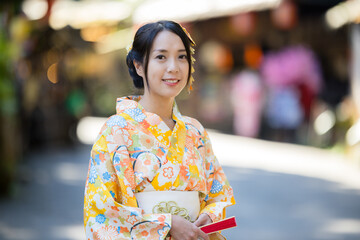 Sticker - Woman wear Japanese yellow kimono at outdoor