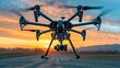 A high-end camera drone in flight against a beautiful sunset sky, capturing aerial photography and videography.