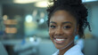 © Inga Bulgakova - Beautiful Afro American woman dentist in dentist surgery. Tooth care concept. Selective focus. Copy space