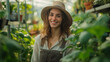 Smiling woman at a vivarium with plants