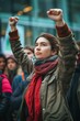 © cff999 - capturing the powerful scene of a International Women’s Day with fists raised