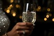 A stunning closeup of a brides hand with a champagne glass showcasing her sparkling engagement ring amidst bubbly excitement. Concept Wedding Photography, Bridal Details, Engagement Ring