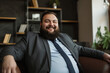 © Creative Valley - Natural Charisma: Plus Size Man in Classic Office Attire