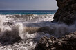 Large waves breaking over rocks