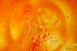 orange bubbles in a glass with drink