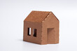 simple DIY family home - cardboard model on wite background