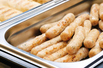 Poster - Boiled sausages in restaurant, breakfast concept background