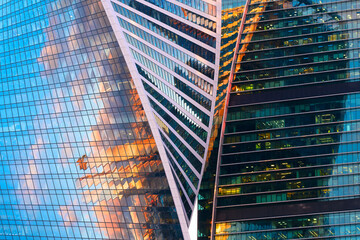 Poster - Large glass skyscrapers with sunset reflection in the windows, business center of the city