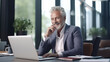 © Mircea Maties - Mature Professional Business Man Typing On A Laptop. Management, Work, Office Business Concept