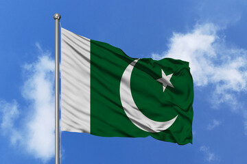 Pakistan flag fluttering in the wind on sky.