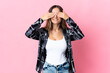 © luismolinero - Young Romanian woman isolated on pink background covering eyes by hands and smiling