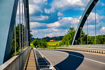 Wall Mural - Bridge over highway and blue sky