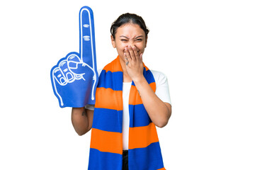 Wall Mural - sports fan woman over isolated chroma key background happy and smiling covering mouth with hand
