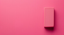 Eraser on a vibrant pink background