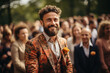 Mature  rugged and masculine man with beard is confidently posing in vibrant colorful suit. Suit features various shades and patterns, making bold fashion statement