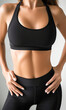 © Stella 16 - Cropped shot of unrecognizable fit woman in lingerie isolated on white background.Generative AI