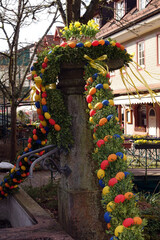 Poster - Osterschmuck an einem Brunnen in Wald-Michelbach