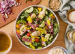 Fresh salad with vegetables, greens in bowl. Homemade delicious lunch salad with cherry tomatoes, spinach, arugula for restaurant, menu, advert or package, close up selective focus