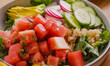 Fresh salad with vegetables, avocado, rise in bowl. Homemade delicious lunch buddha bowl salad with tomato for restaurant, menu, advert or package, close up selective focus