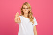 © Prostock-studio - Determined young blonde lady gesturing stop with hand, portrait shot