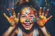 Young girl having fun painting with bright colors, hands stained with vibrant paint