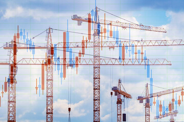 construction industry. arrows of tower cranes against sky. financial industry growth chart. falling 