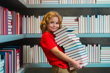 Poster - Back to school. Kid reads books in the library. Schoolboy with book in school library. Literature for reading. Child learning from books. School education and clever talented pupil genius.