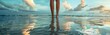 a beautiful woman standing in shallow water looking at the endless sky in front of her