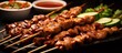 chicken and beef satay meat stick skewer with cucumber