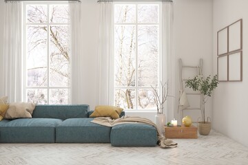 White living room with sofa and winter landscape in window. Scandinavian interior design. 3D illustration