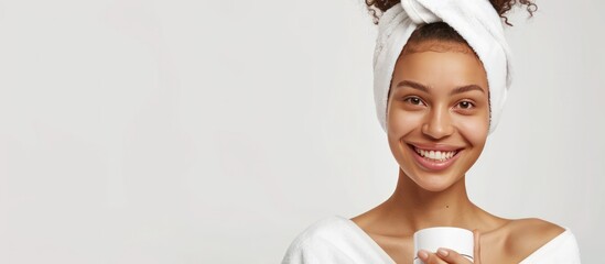 Wall Mural - Portrait beautiful woman model applying moisturizing cream cosmetic on face white background.