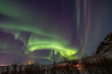 scenic view of aurora borealis over iceland
