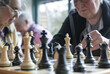 Elderly People Strategizing in Chess Game Club Competition. Concept of nursing home or house. 