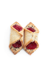 Wall Mural - Mini biscuits filled with berry jam isolated on white background