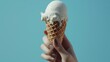Ice cream cone on a blue background. The woman holding the ice cream by hand. --ar 16:9 --v 6 Job ID: 10f40359-1f61-4649-a44e-31a50849ef93