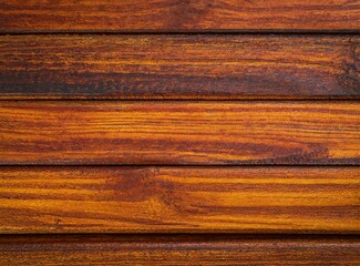 Canvas Print - Medium brown wood texture background viewed from above. The wooden planks are stacked horizontally and have a worn look. This surface would be great as design element for a wall, floor, table etc