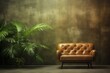 Retro sofa made of brown leather and palm tree on the background of a grunge wall, quiet luxury concept