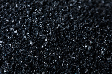 Wall Mural - Macro close up of Silicon Carbide black sand size. Fine particle silicon carbide pile up, White background Isolated, particle element object