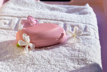 Bar Of Pink Soap On White Towel. Soap, White And Pink Soapwort Flowers. SPA, Hygiene Products. Saponaria Officinalis